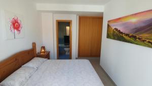 Posteľ alebo postele v izbe v ubytovaní Apartamento Jerez Terraza Privada