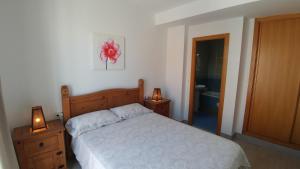 Posteľ alebo postele v izbe v ubytovaní Apartamento Jerez Terraza Privada