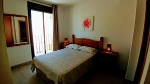 Posteľ alebo postele v izbe v ubytovaní Apartamento Jerez Terraza Privada