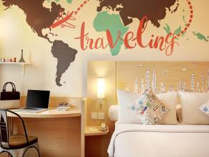Giường trong phòng chung tại Ibis Jakarta Harmoni