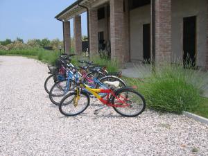 a group of bikes parked outside of a building at Agriturismo La Barena in Jesolo