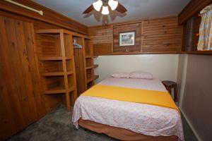 Un pat sau paturi într-o cameră la Blue Island Divers Casa Descanso
