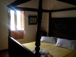 Postel nebo postele na pokoji v ubytování Cortijo Urrá Manor House, Sorbas