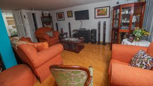 TV a/nebo společenská místnost v ubytování Vivienda Turística "El Coronel"