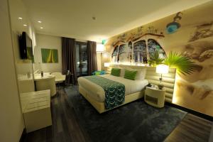 Posteľ alebo postele v izbe v ubytovaní Hotel Indigo Barcelona - Plaza Catalunya 4Sup by IHG