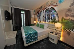 Posteľ alebo postele v izbe v ubytovaní Hotel Indigo Barcelona - Plaza Catalunya 4Sup by IHG