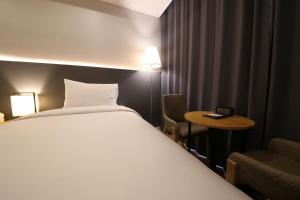 The Mains Hotel客房内的一张或多张床位