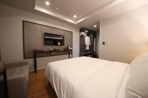 The Mains Hotel客房内的一张或多张床位