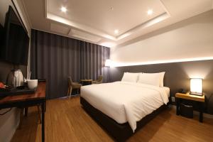 The Mains Hotel客房内的一张或多张床位