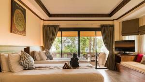 Ein Sitzbereich in der Unterkunft Anda Lanta Resort