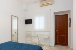 Letto o letti in una camera di BOHEMIA SANLUCAR