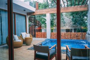 Bazén v ubytování Kundala Beach Resort Hua Hin nebo v jeho okolí
