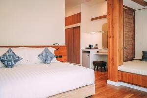 Postel nebo postele na pokoji v ubytování Kundala Beach Resort Hua Hin