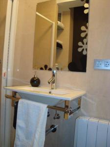 Kúpeľňa v ubytovaní Apartamentos Castrón Douro