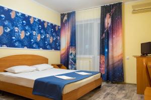 Cama o camas de una habitación en Hotel Kosmos