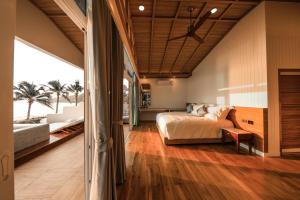 Postel nebo postele na pokoji v ubytování Kundala Beach Resort Hua Hin + 37 fotografií