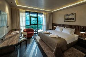 Кровать или кровати в номере Hotel Bosfora Plus