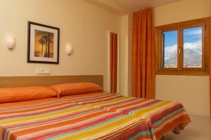 Postel nebo postele na pokoji v ubytování Albir Garden Resort + 37 fotografií