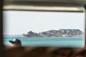a view of a body of water from a window at PK25 Dakhla in Dakhla