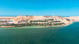 an aerial view of an island in the ocean at PK25 Dakhla in Dakhla
