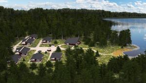 コリンカイラにあるKolin Lotus Cottagesの湖上の島の空中のリゾートの景色