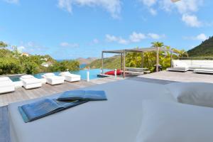 a villa with a view of a swimming pool at Dream Villa Flamands 744 in Anse des Cayes