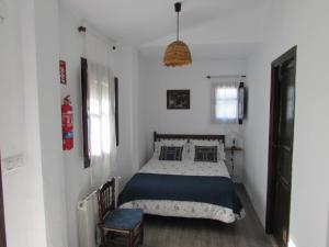 Krevet ili kreveti u jedinici u okviru objekta Apartamentos Rurales Fuente de Marzo