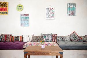 a living room with a couch and a coffee table at PK25 Dakhla in Dakhla
