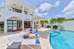 Villa con piscina y casa en Dream Villa Shore Point 553, en Lowlands