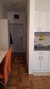 Kuchyň nebo kuchyňský kout v ubytování Apartman Ana