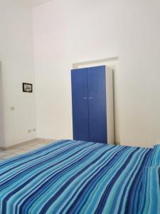 Postel nebo postele na pokoji v ubytování ANFORA Blu
