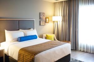 Postel nebo postele na pokoji v ubytování Hotel Indigo Hattiesburg by IHG