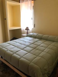 Postel nebo postele na pokoji v ubytování Ka suporti