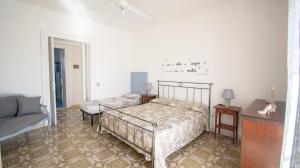 Кровать или кровати в номере VILLA SALINA MONACI