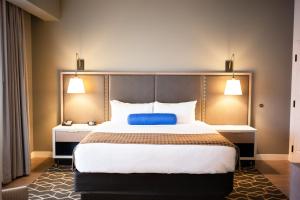 Postel nebo postele na pokoji v ubytování Hotel Indigo Hattiesburg by IHG