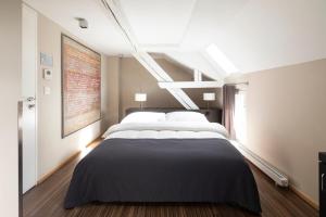 Voodi või voodid majutusasutuse Altstadt Hotel toas