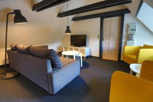 TV a/nebo společenská místnost v ubytování Blåvandshuk Golf Hostel