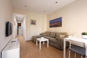 TV a/nebo společenská místnost v ubytování MUNNE - Spacious apartment FC Barcelona