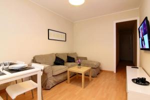 TV a/nebo společenská místnost v ubytování MUNNE - Spacious apartment FC Barcelona