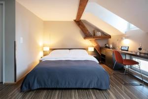 Voodi või voodid majutusasutuse Altstadt Hotel toas