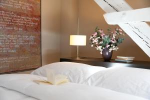 Voodi või voodid majutusasutuse Altstadt Hotel toas