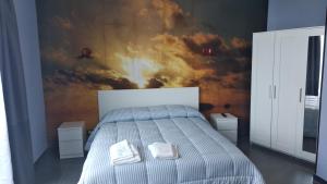Voodi või voodid majutusasutuse B&B Vecchia Darsena toas
