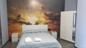 Postel nebo postele na pokoji v ubytování B&B Vecchia Darsena