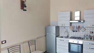 Köök või kööginurk majutusasutuses B&B Vecchia Darsena