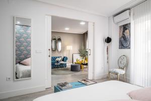 Postel nebo postele na pokoji v ubytování Deluxe Rue Bohème