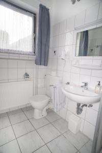 Ένα μπάνιο στο Hotel Garni Haus Schönberger