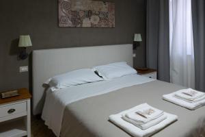 Postel nebo postele na pokoji v ubytování Apollo Bed & Breakfast