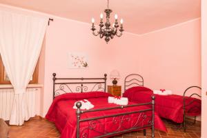 Postel nebo postele na pokoji v ubytování B&B Da Natalina