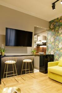 A television and/or entertainment centre at Soho Apartments
