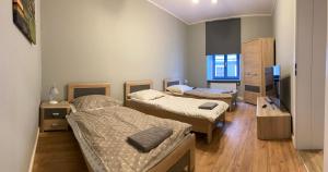 Apartament Aleksandra 객실 침대